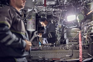 ground-crew-working-with-airplane-system