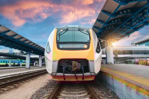 high-speed-train-on-the-railway-station-at-sunset-2024-11-27-13-10-24-utc