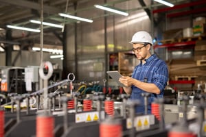 young-busy-engineer-in-hardhat-and-workwear-search-2023-11-27-05-10-49-utc